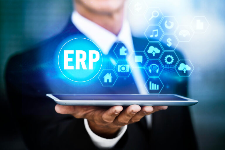 ERP concept with connected business modules above a tablet